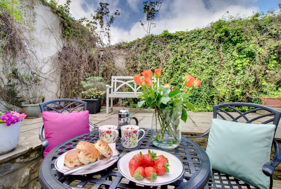 Private walled patio garden to rear