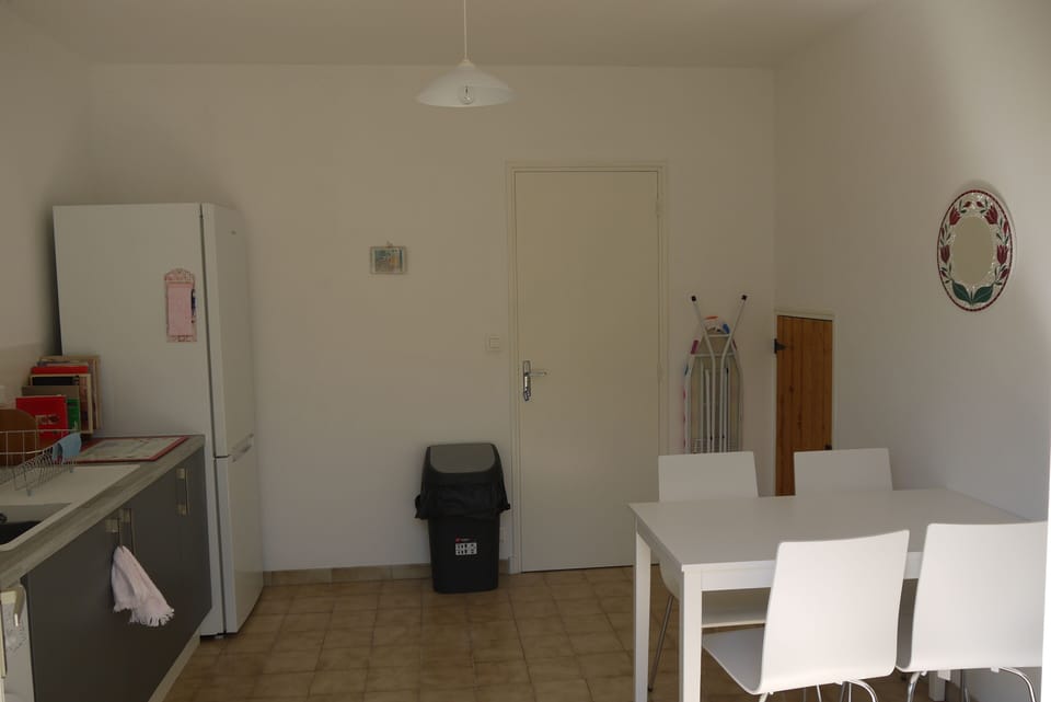 Summer Kitchen with dining area and fridge freezer 