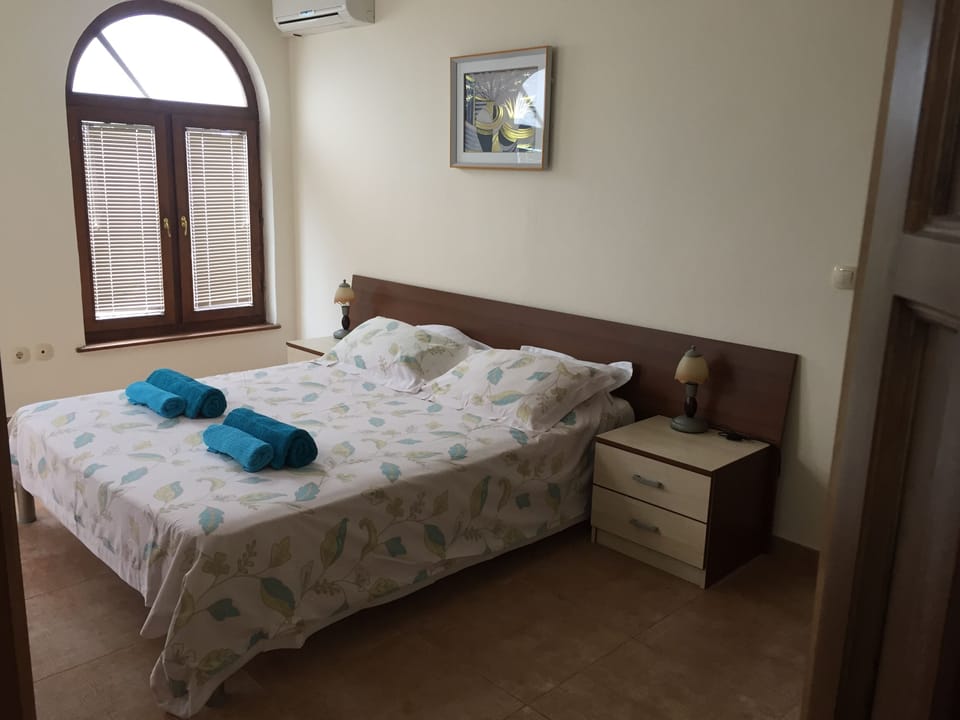 Double room with ensuite with bath with shower.