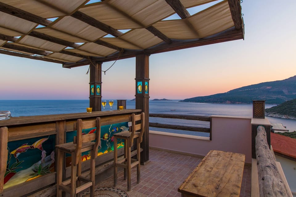 Morning Coffee and Sunrise over Kalamar Bay