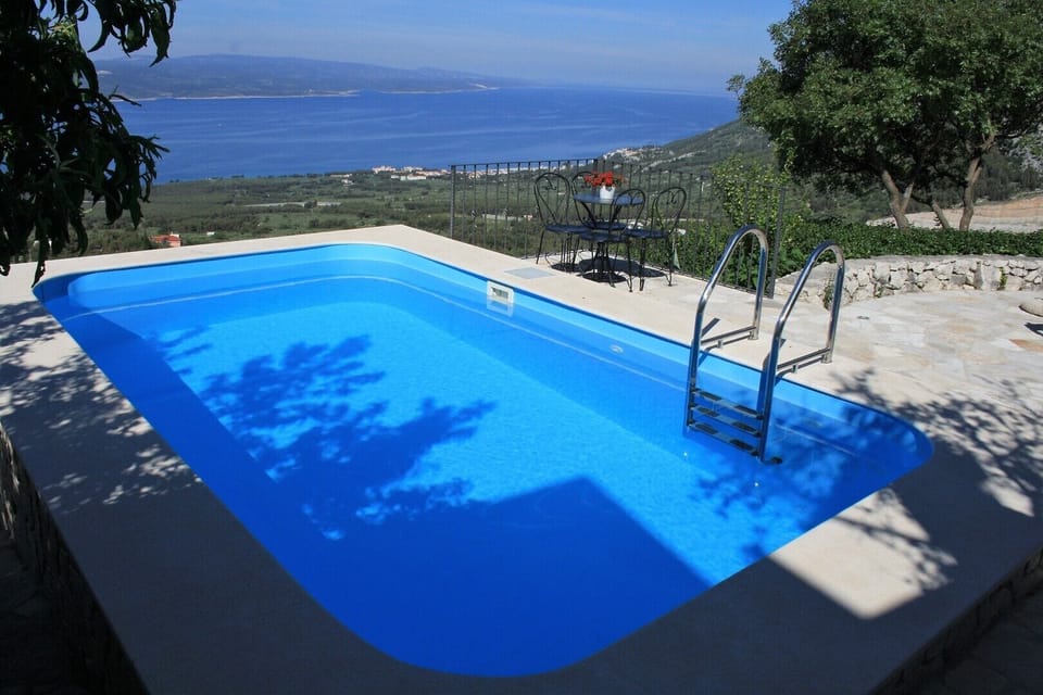 Private pool with sea and mountain views