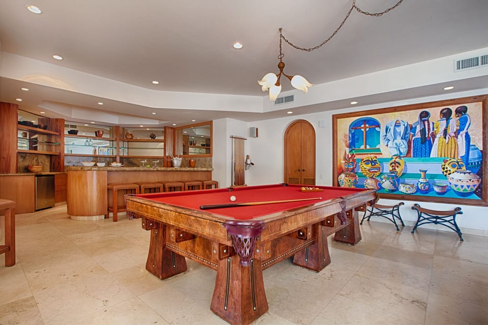 Billiard Table on the lower level with the pool just a few steps away!