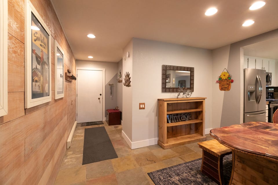 Lower level condo, 4 steps up before entering, and two steps down to living room