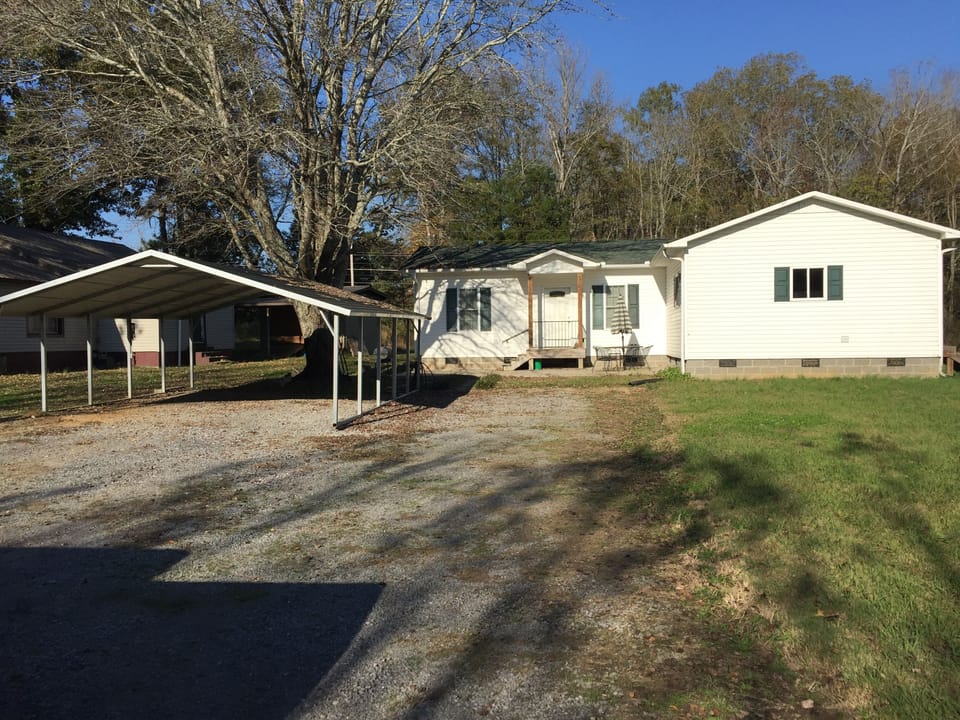 Front view with covered parking