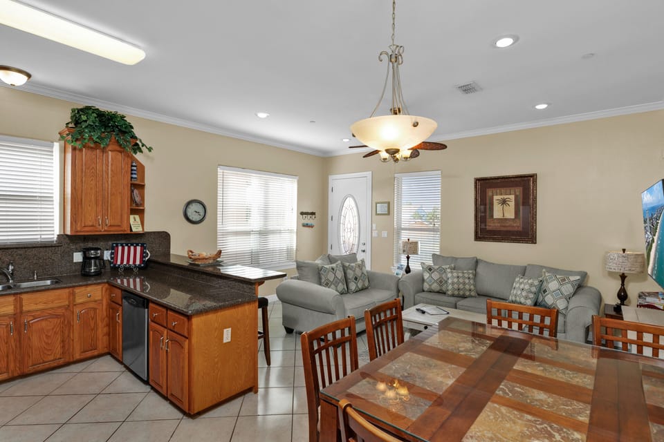 The open-concept layout keeps everyone connected whether you're dining, relaxing, or planning tomorrow's adventures