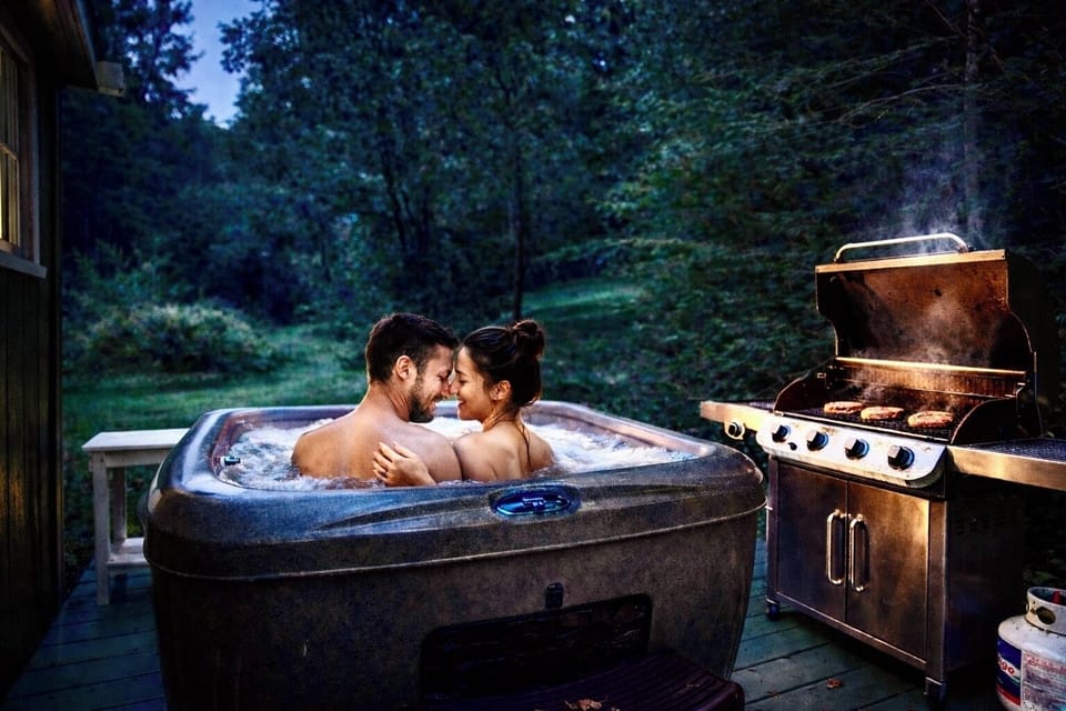 9 private acres, outdoor hot tub offers quiet forest views, star-filled nights.