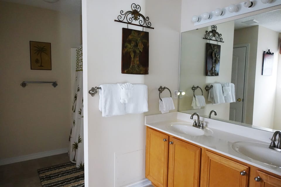 His and Hers Master Bathroom; Full Length Mirror located in Bedroom