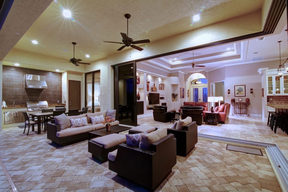 View of lanai and great room. Ninety degree sliders fully open.