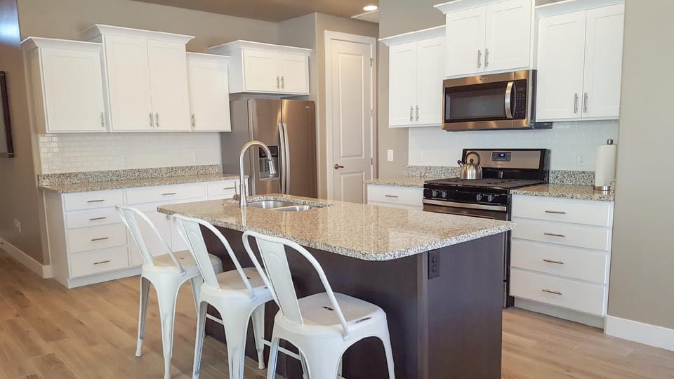 Kitchen with bar seating.