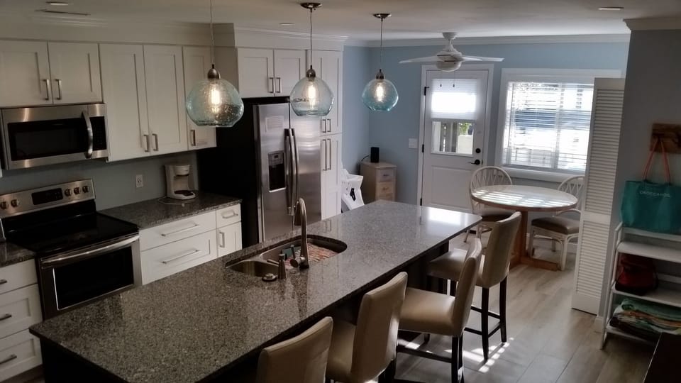 Seats four at island dining. Spacious handicap friendly 1st floor.