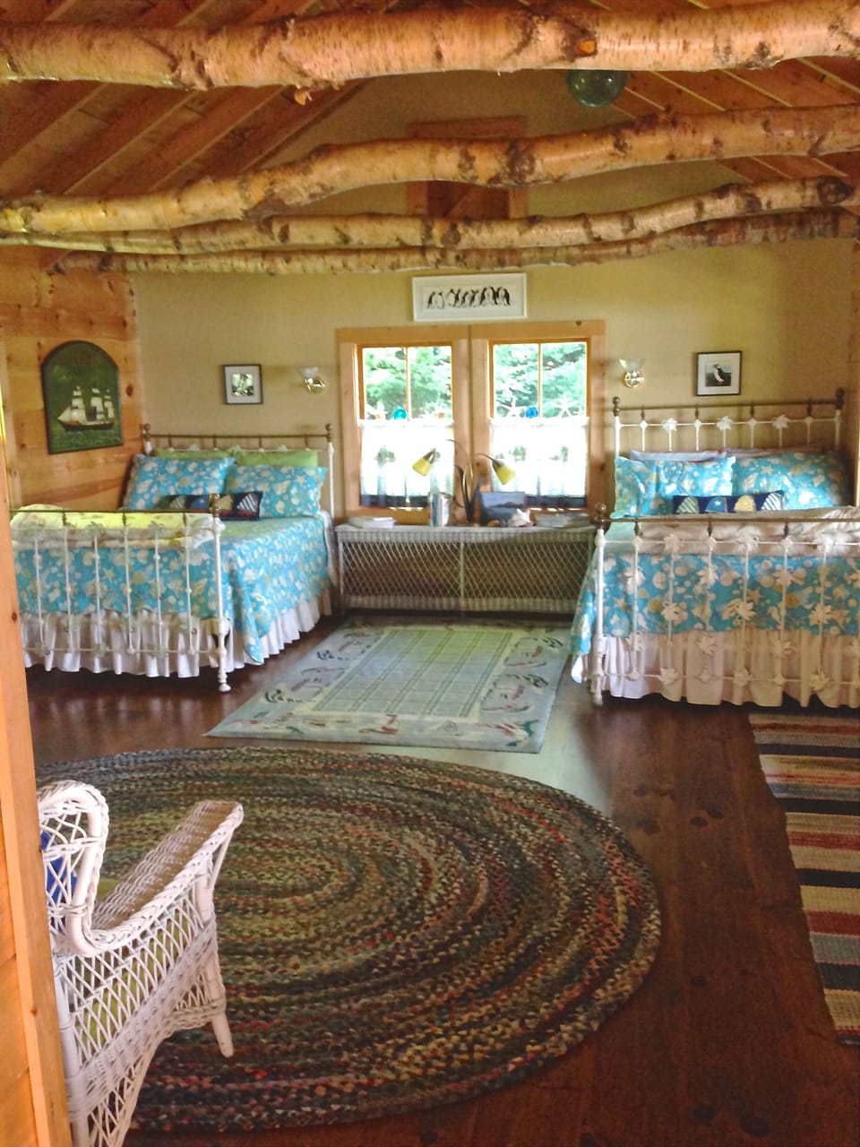 First floor bedroom with 2 full size beds, TV and ocean views