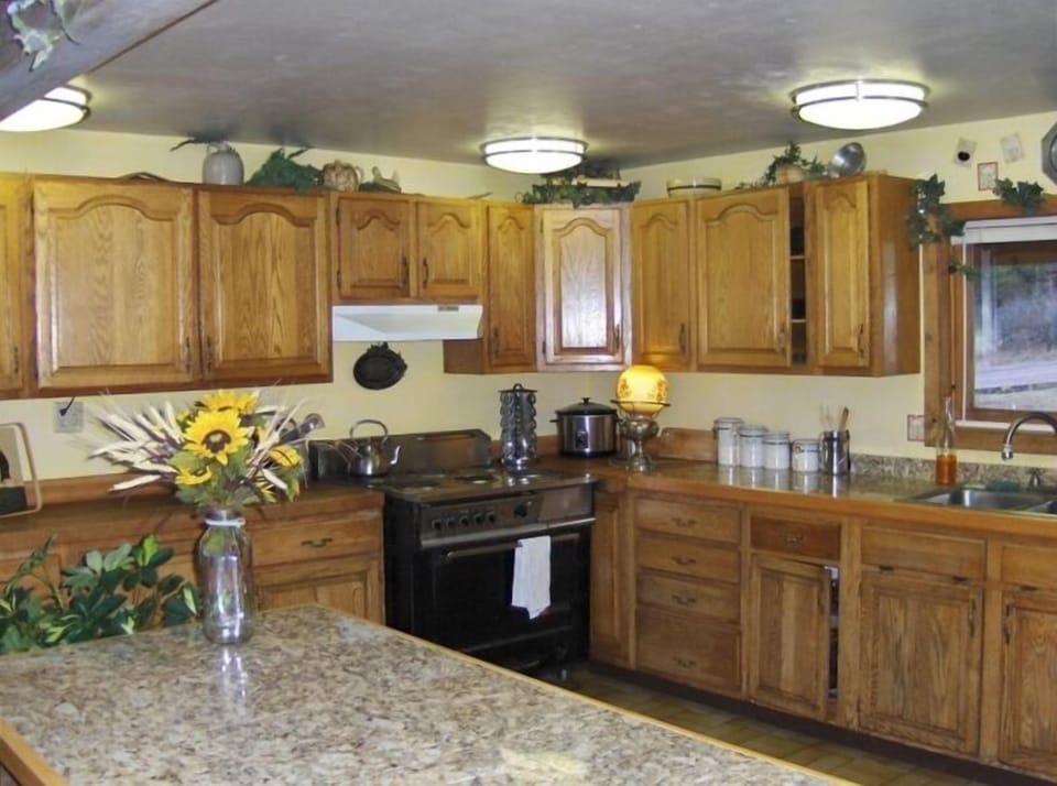 This large country kitchen is fully equipped for large family cooking.