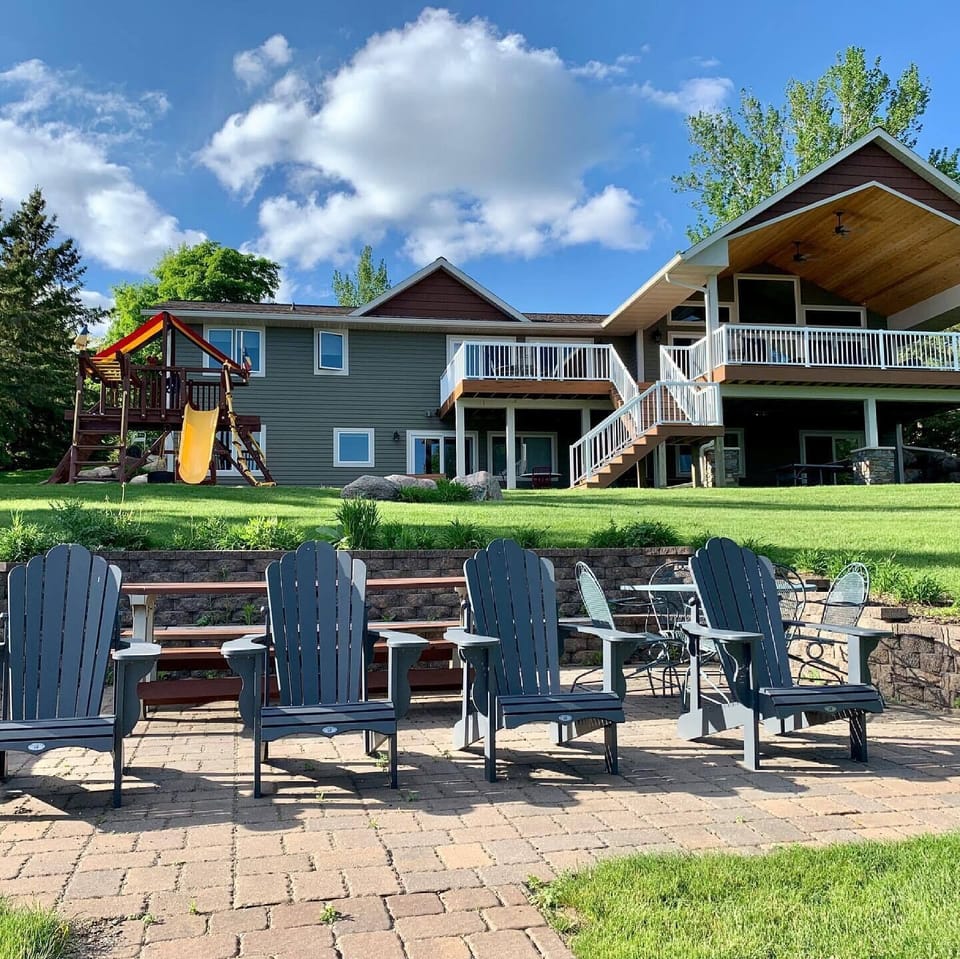 Great patio with firepit for gathering and s'mores! Rotate chairs for lakeview!
