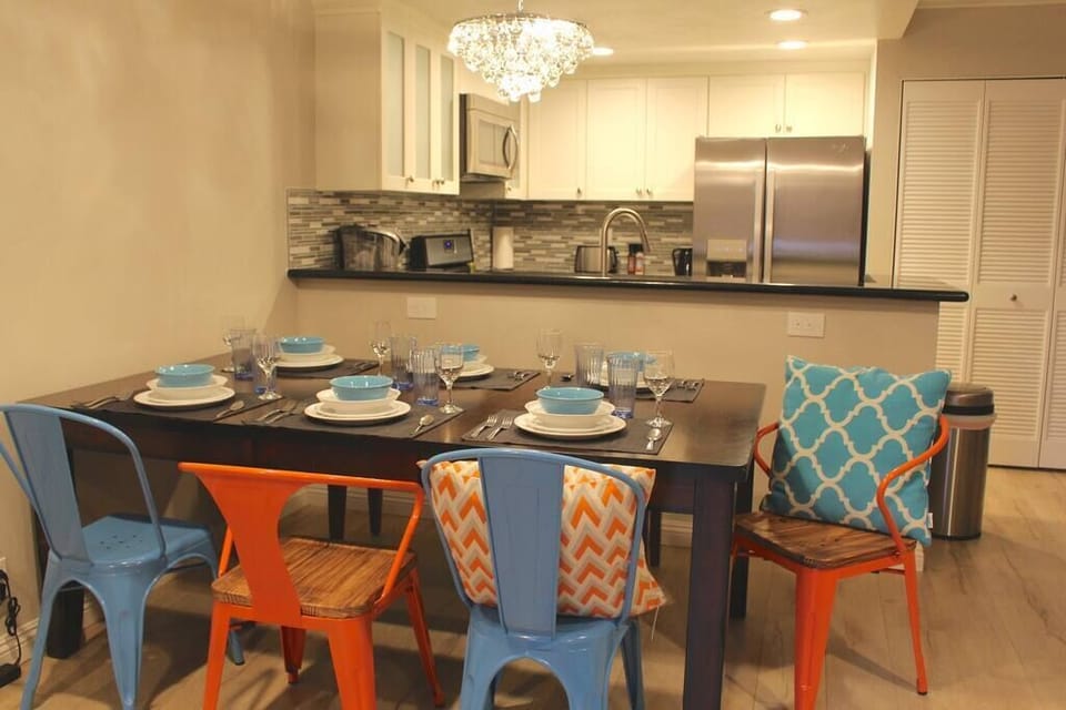 Dining table next to kitchen