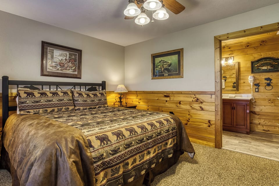 Wears Valley Log Cabin with a View "Getaway Mountain Lodge" - Lower level bedroom two with king size bed
