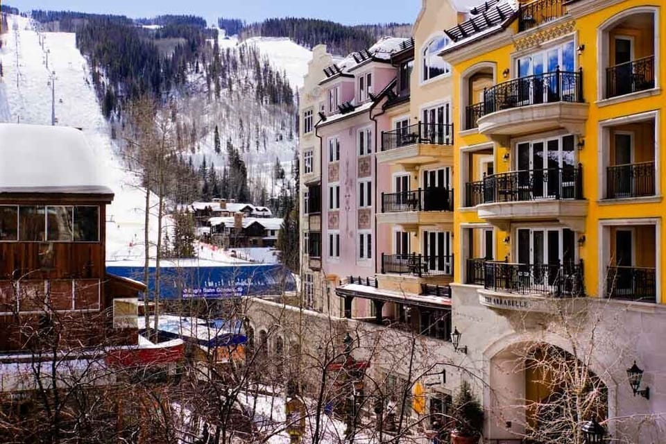 View from balcony to Arabelle Hotel and Eagle Bahn Gondola entrance (blue roof)