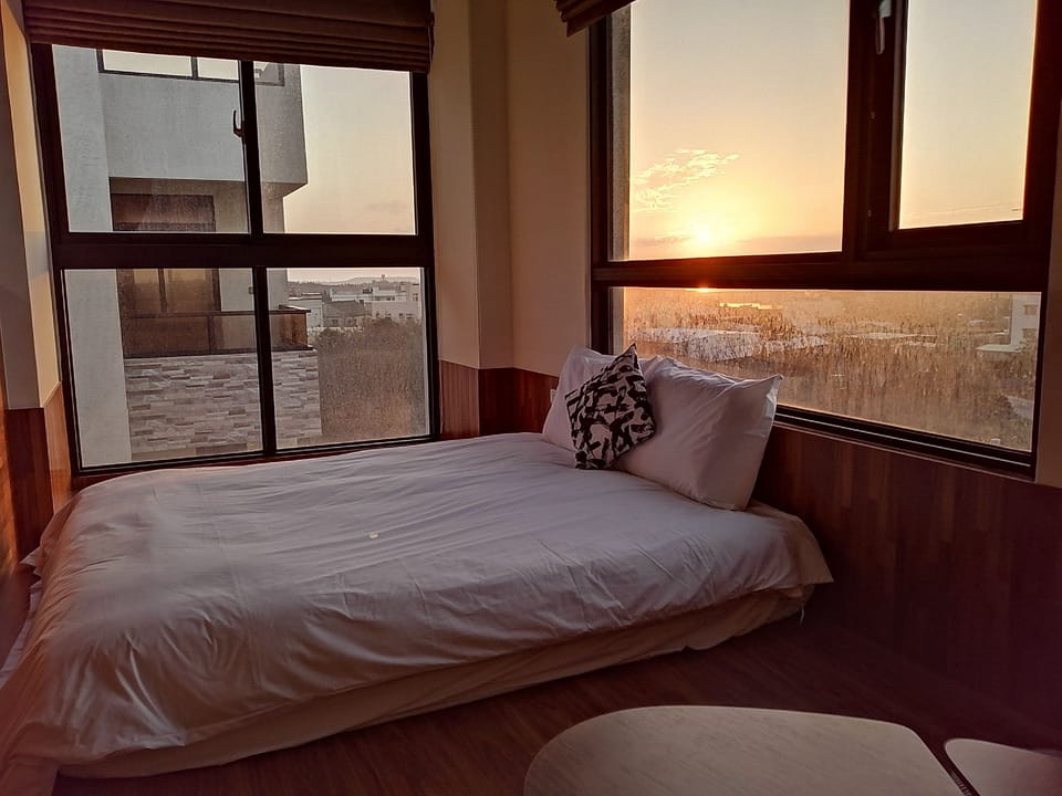 Senior Quadruple Room | Desk, blackout drapes, free WiFi, bed sheets