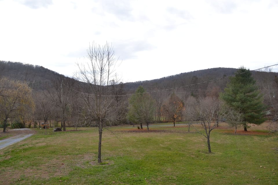 view of mountains during winter from front porch