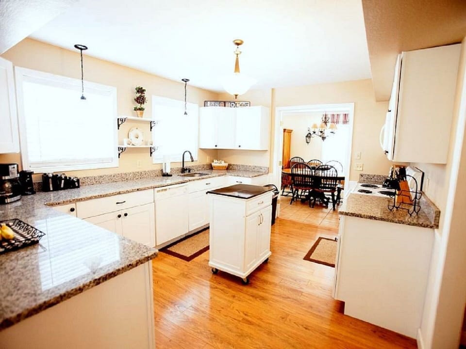 The kitchen is equipped to cook a gourmet meal or just a frozen pizza