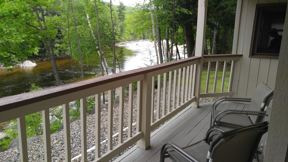 Deck accessed via slider in the living room. Beautiful river and mountain views.