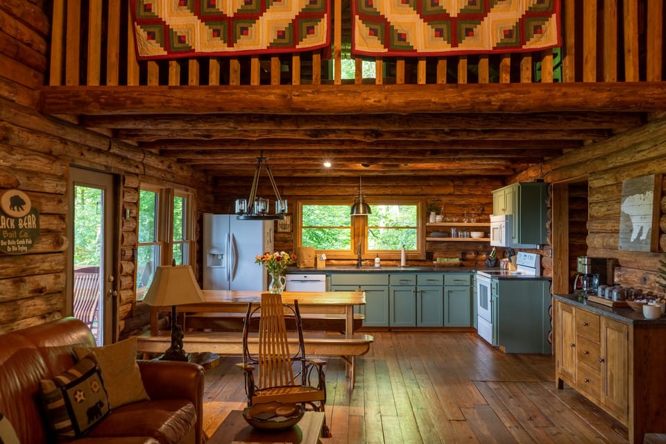 View from living area looking into kitchen and dining area