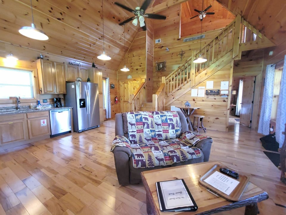 Reclining loveseat and handmade log furniture 