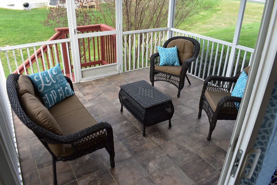 Screened in porch (back)
