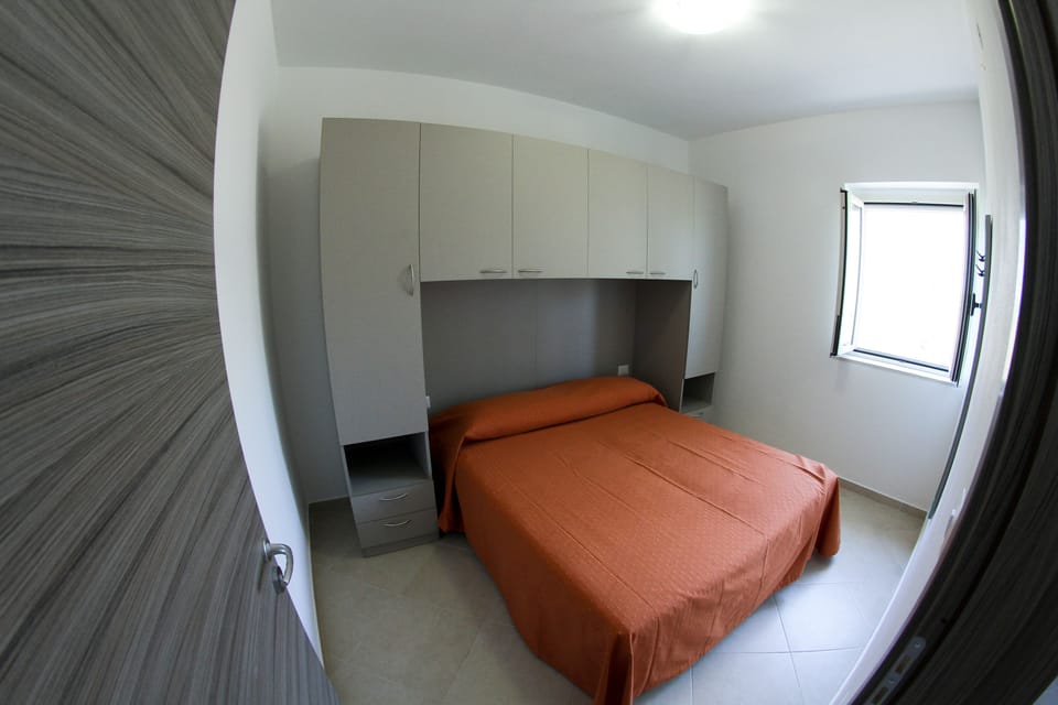 Standard Apartment, 1 Bedroom, Courtyard View, Ground Floor | 1 bedroom, soundproofing, bed sheets, wheelchair access