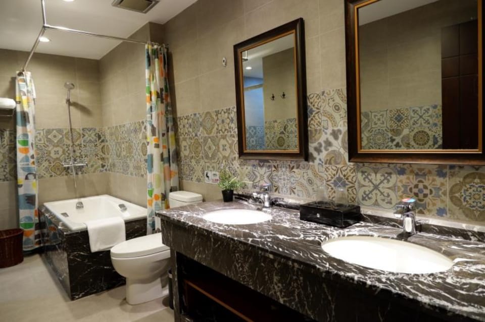 Deep soaking tub, rainfall showerhead, free toiletries, hair dryer