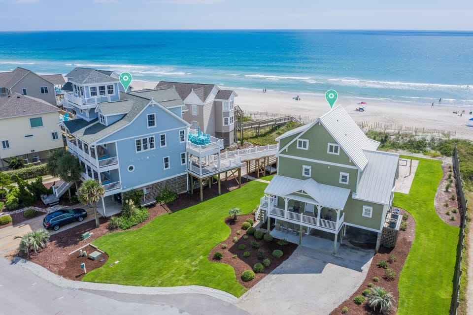 Pearl by the Sea(green house) and our Flip Flop Inn (7-bdrm) to the left 