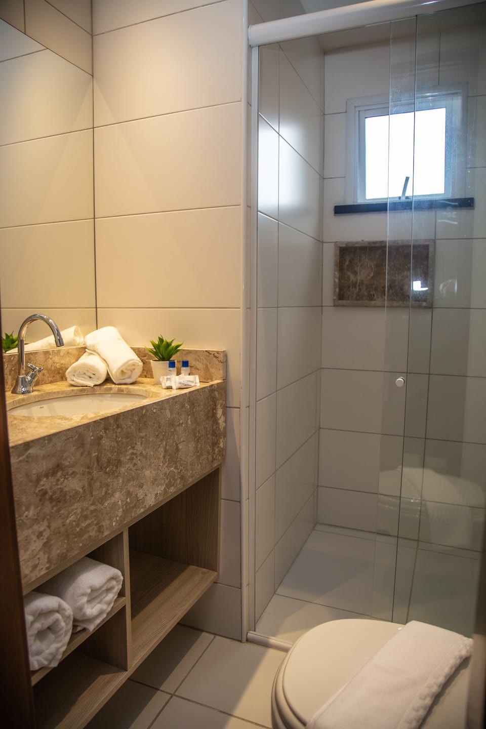 Shower, free toiletries, hair dryer, towels
