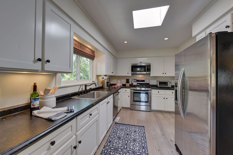 Large, well appointed galley kitchen with stainless steel appliances.