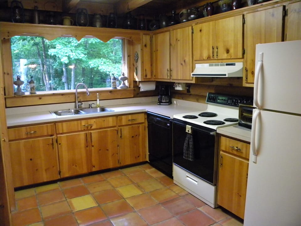 Spacious, well equipped kitchen opens to dining and living rooms