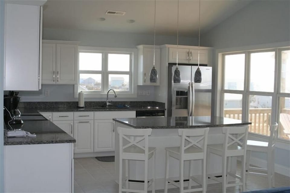 Gourmet Kitchen with granite counters and ocean view