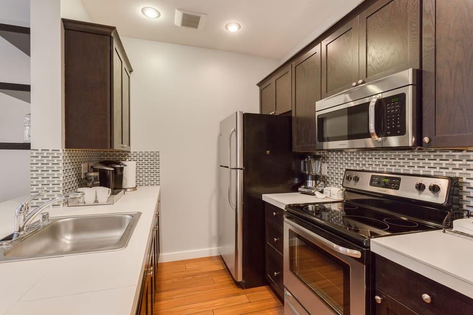 All new stainless steel appliances and kitchen cabinets.
