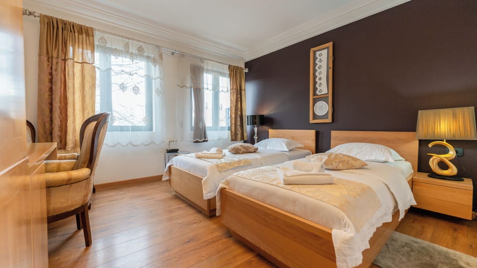 Comfort Room, 2 Twin Beds, City View | Minibar, in-room safe, desk, blackout drapes
