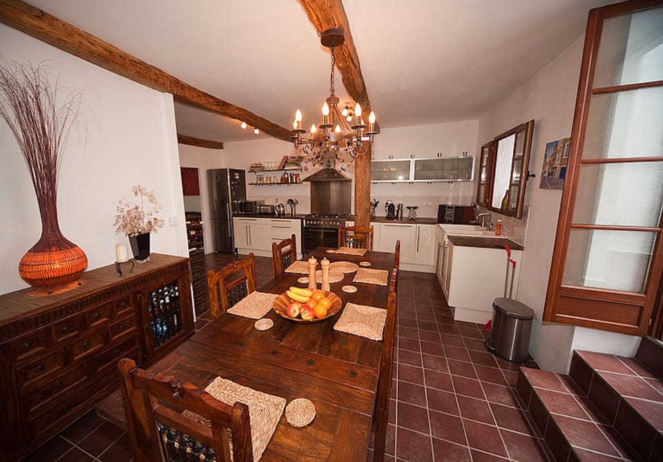Dining room and kitchen (patio doors to the right).
