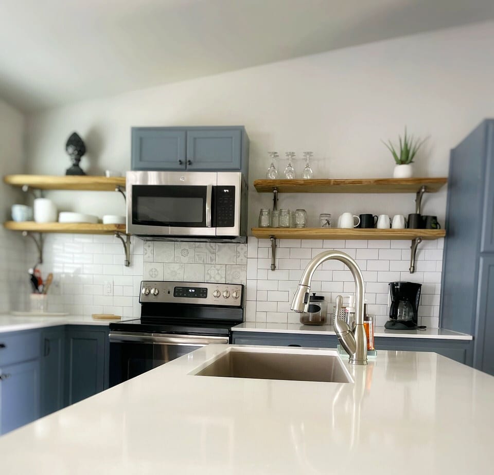 Large farm sink and quartz countertops