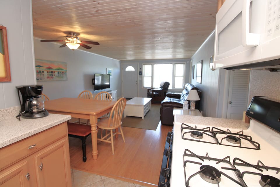 Kitchen Looking To Family Room and Dining