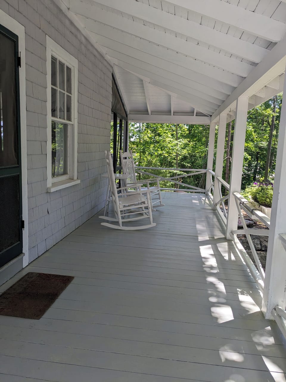 front porch with rocking chairs