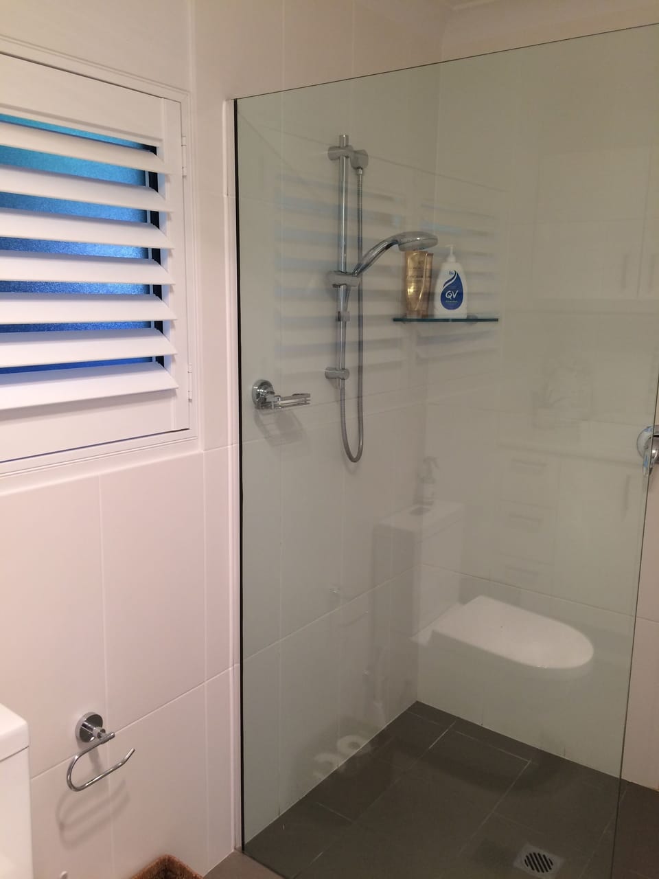 Bathroom/laundry with toilet and shower