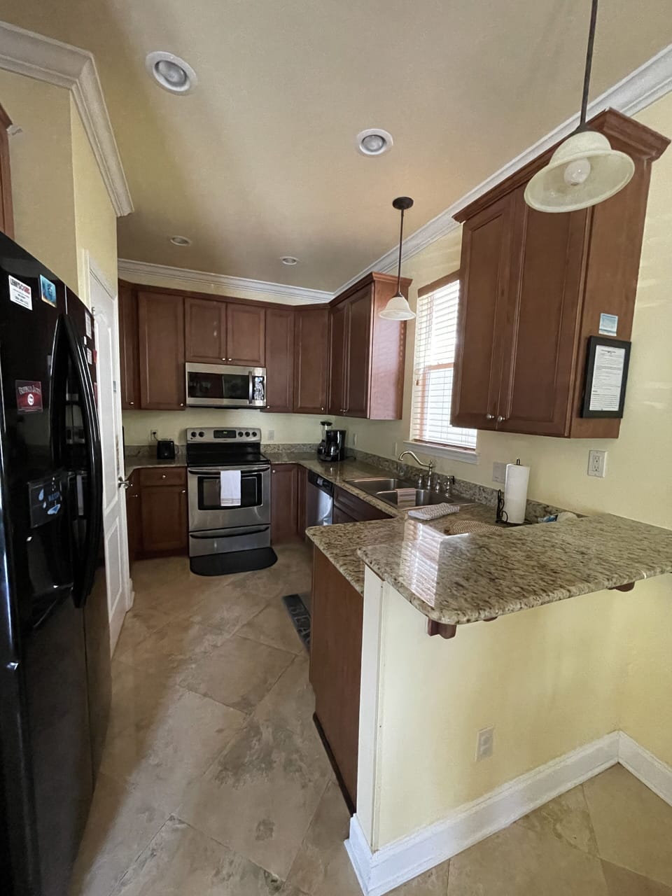 The kitchen is fully stocked and includes a refrigerator 2 coffee makers.