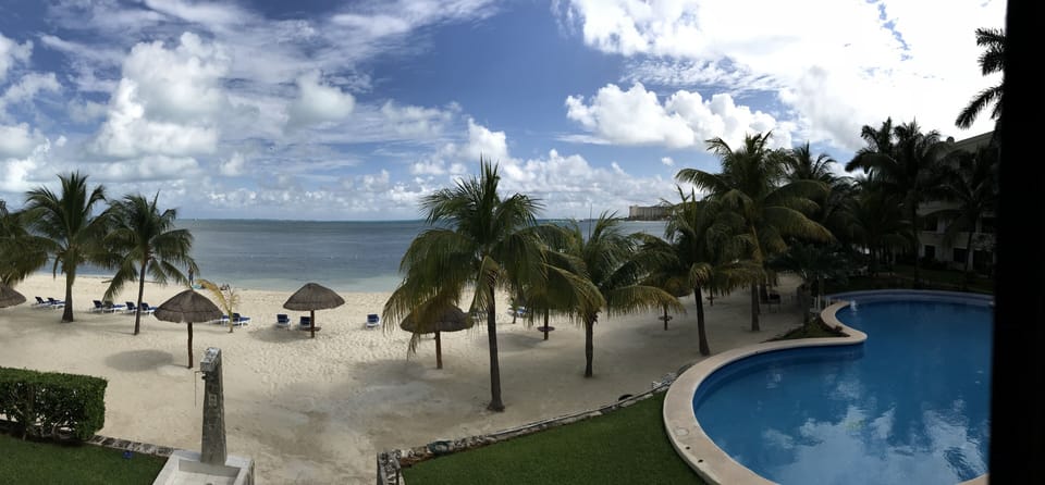 View from the apartment to the beach and pool areas