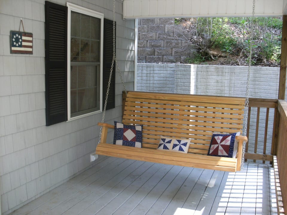Porch swing - my favorite place to read a book while listening to the creek.