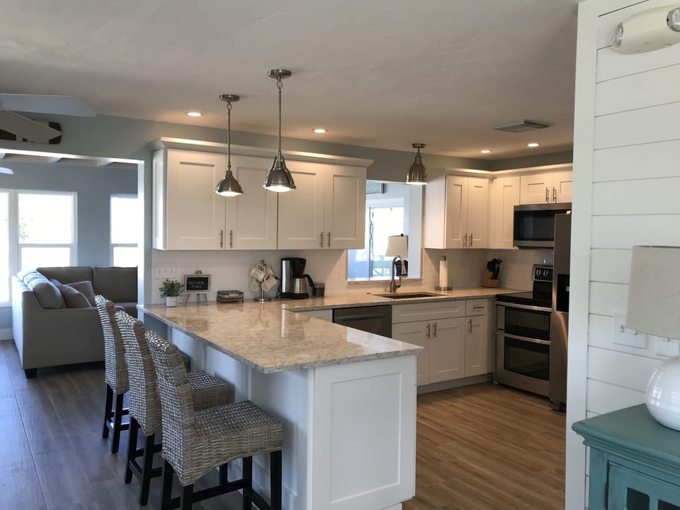 Shaker Cabinets match the doors and shiplap !