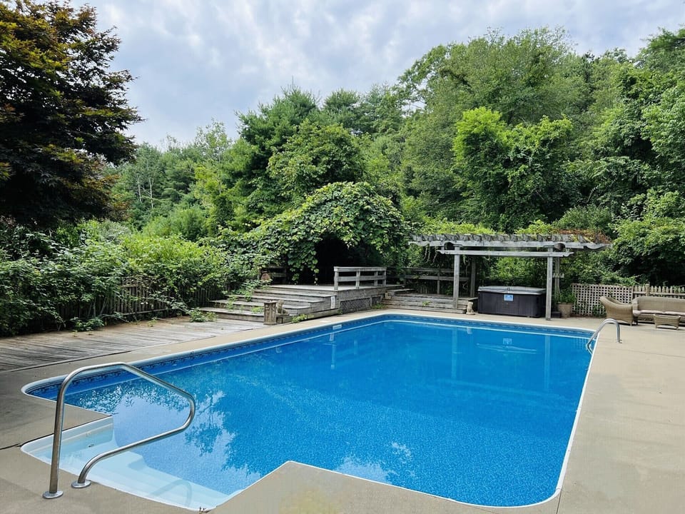 Large salt water pool + hot tub + grill + gazebo w seating area, small fridge