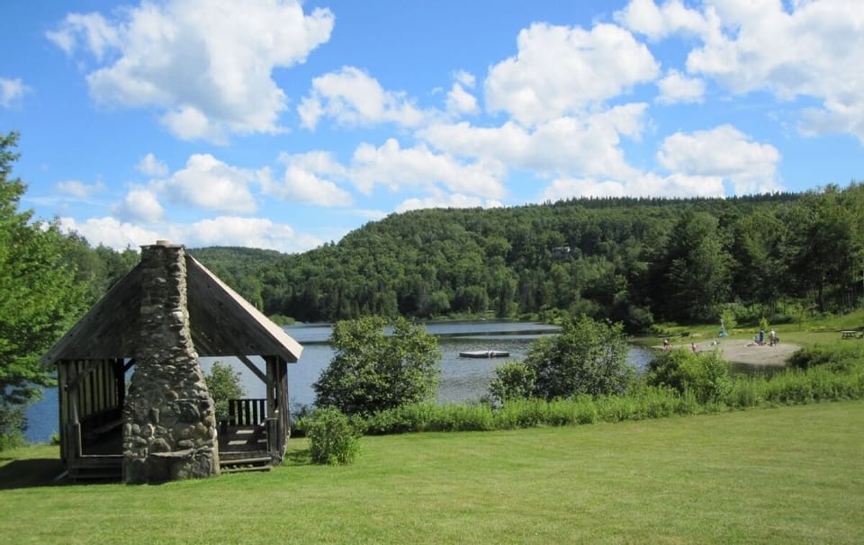 Spruce Lake Estates private beach/lake on a nice, sunny day.