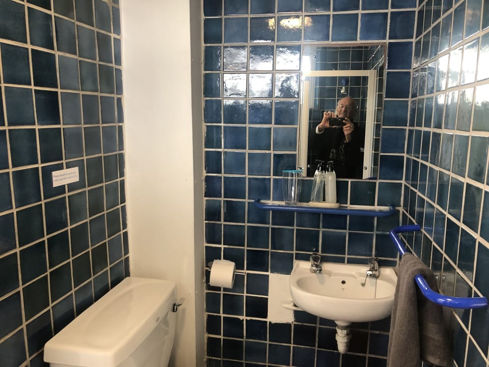 one of two shower / toilets en suite