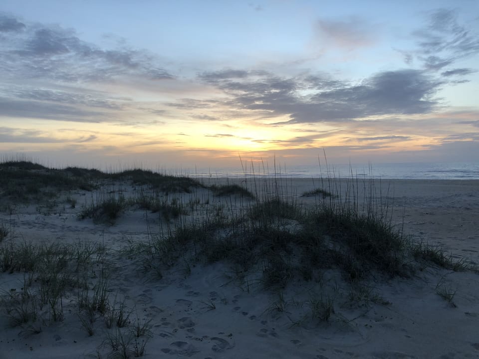 View of sunrise only steps from the front deck. 