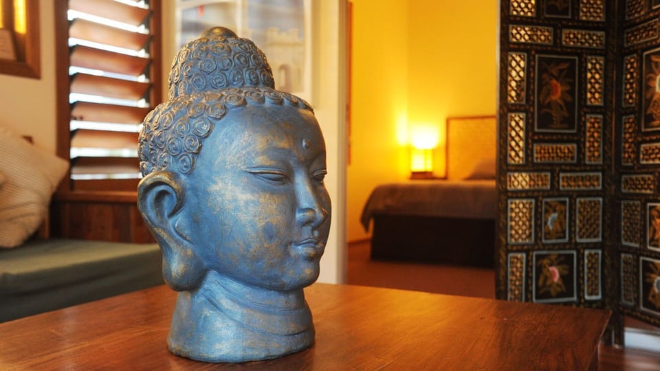 Buddha loves it in the sunroom!
